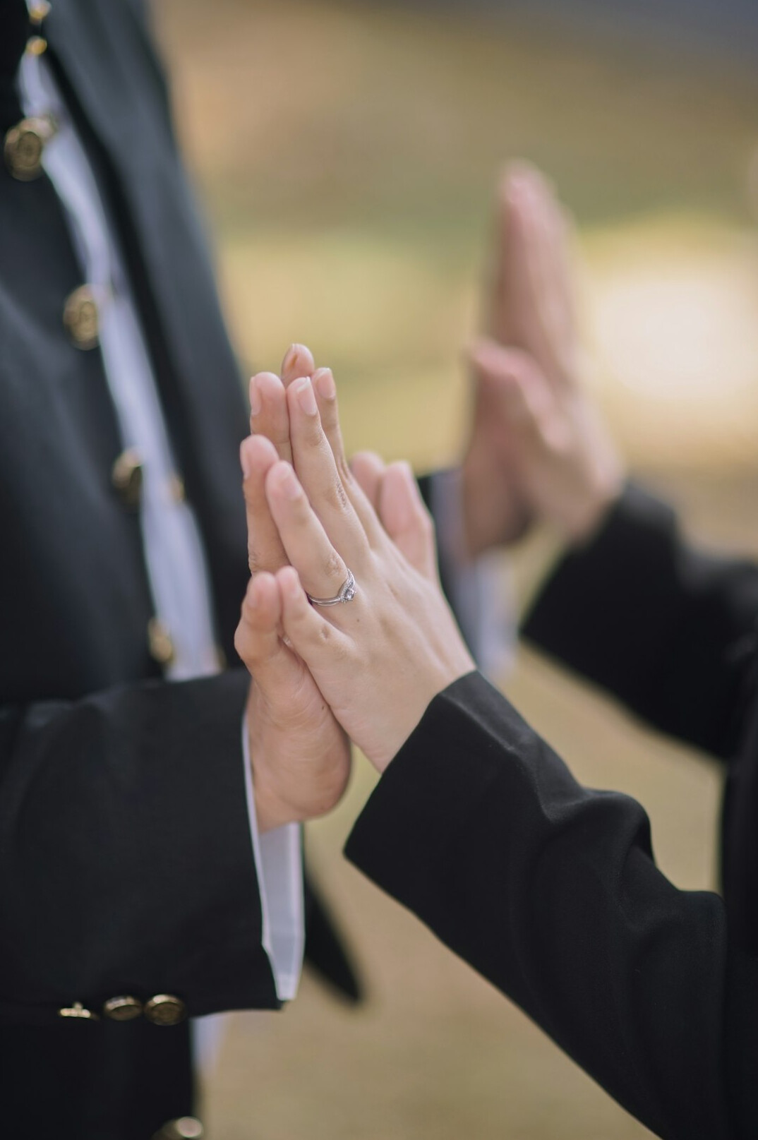 Two professionals shaking hands in an office